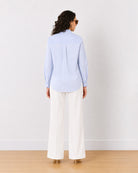 Emma blue and white stripes cotton shirt, back view showing the centre back pleat