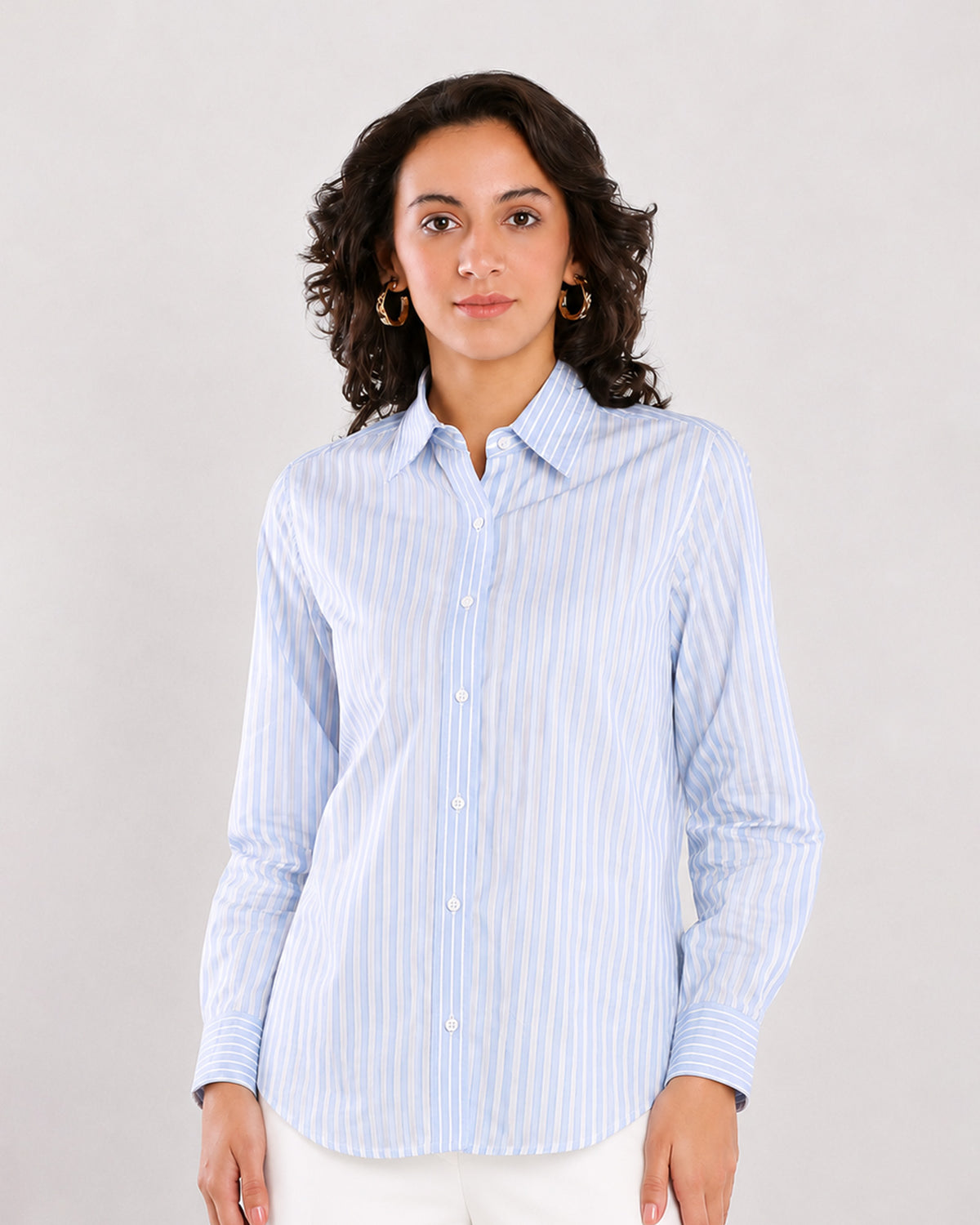 Emma blue and white stripes cotton shirt with a classic collar and curved hem, front view