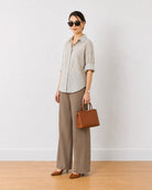 Empathy black and ivory stripes cotton oversized shirt, angled front view