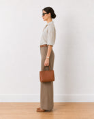 Empathy black and ivory oversized cotton shirt with a relaxed oversized fit, side profile view