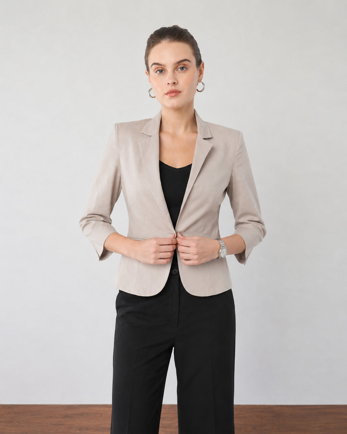 Close-up of Faith beige cropped blazer notch lapel and single-button front