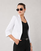 Faith white cropped linen blend blazer with notch lapel and 3/4 sleeves, angled view