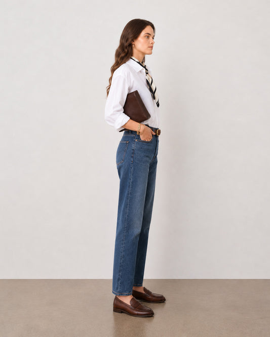 Falcon white linen shirt with a dropped shoulder, side profile view