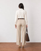 Gabriela beige smart casual linen pants with cotton voile lining, back view with welt pockets