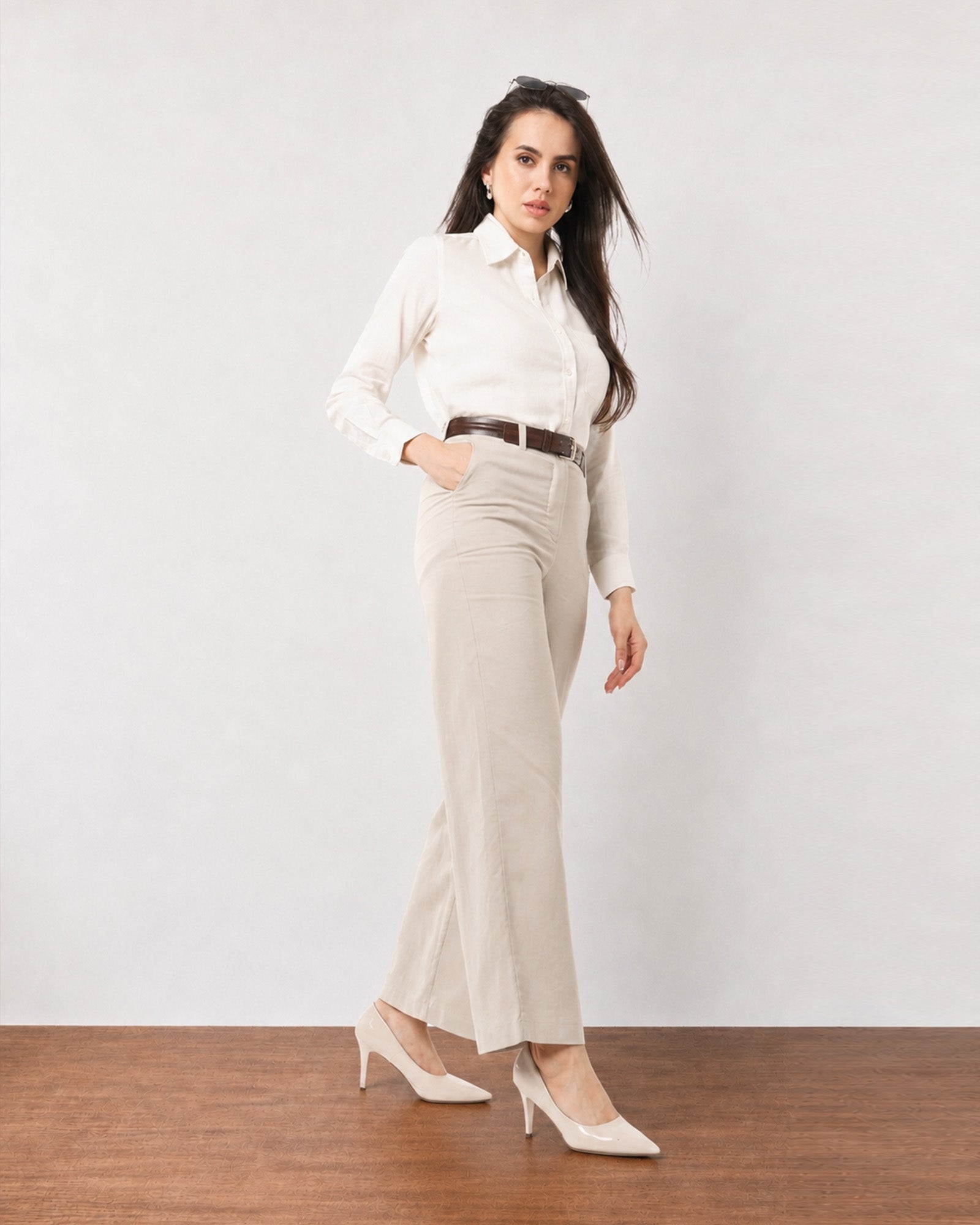 Gabriela beige breathable linen office trousers with cotton voile lining, walking view