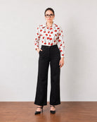 Gabriela black breathable linen pants with cotton voile lining, front view with hand in pocket