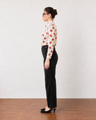 Gabriela black linen pants with full cambric lining, side profile showing a straight leg