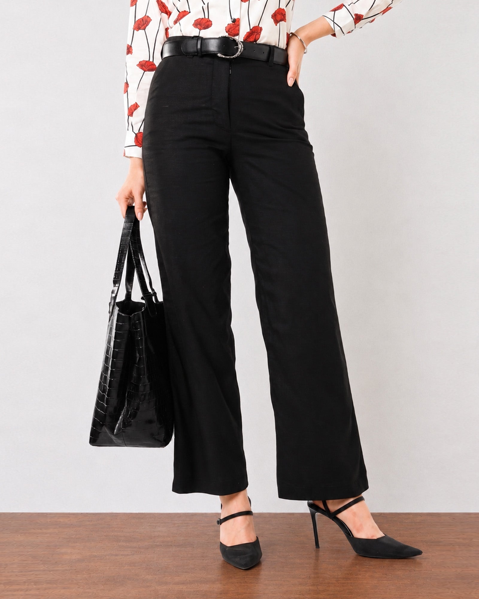 Gabriela black linen trousers with full cambric lining, smart casual walking view