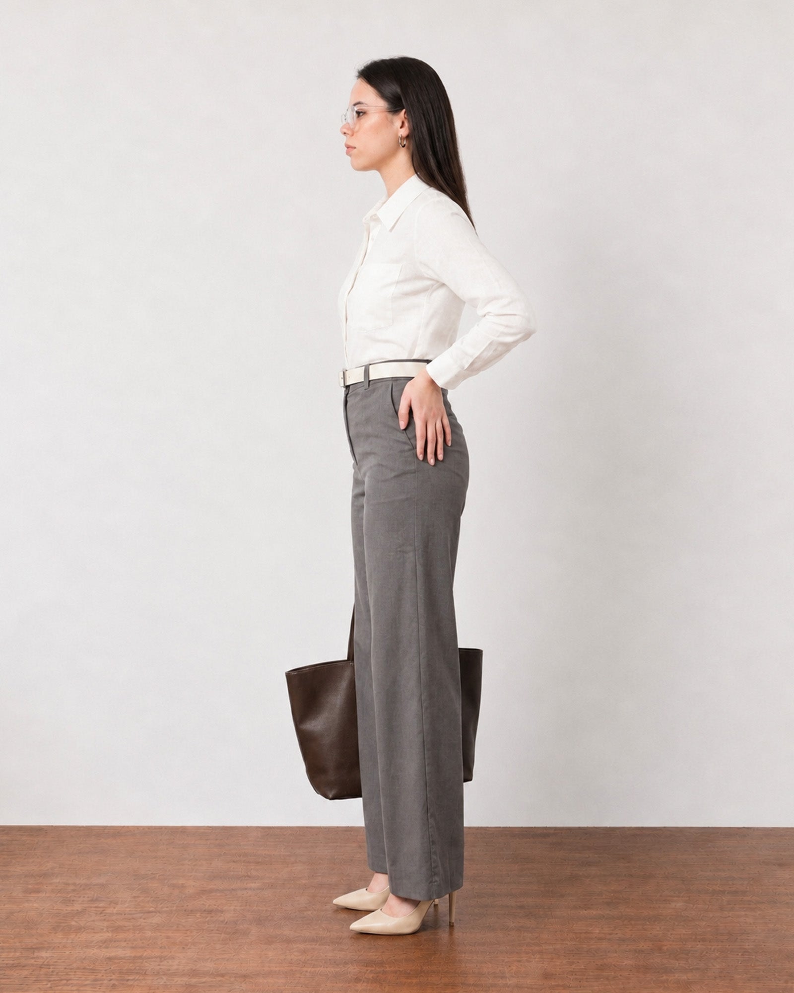 Gabriela charcoal grey linen pants with cotton voile lining, side profile view