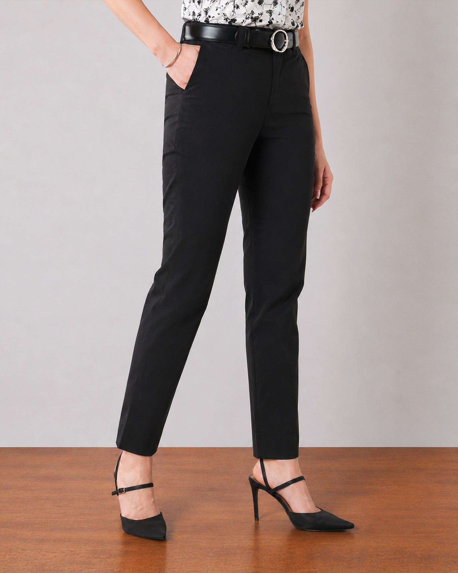Close-up of Galaxy black cotton chinos ankle-length hem and slanted side pocket