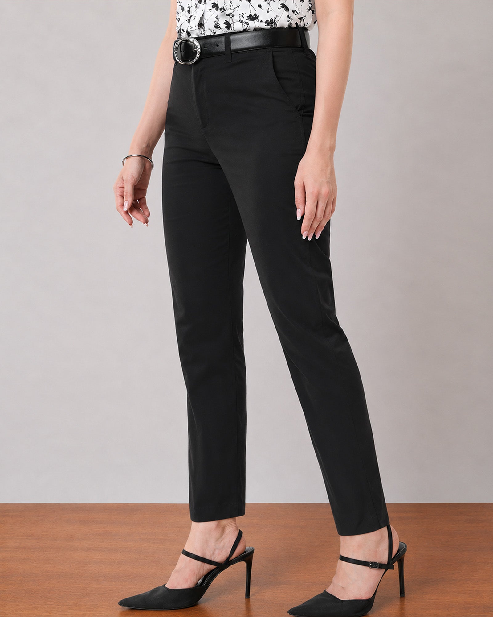 Galaxy black stretch chinos, walking view showing a slim straight leg