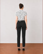 Galia black and white floral printed top, back view showing a relaxed Barcelona fit