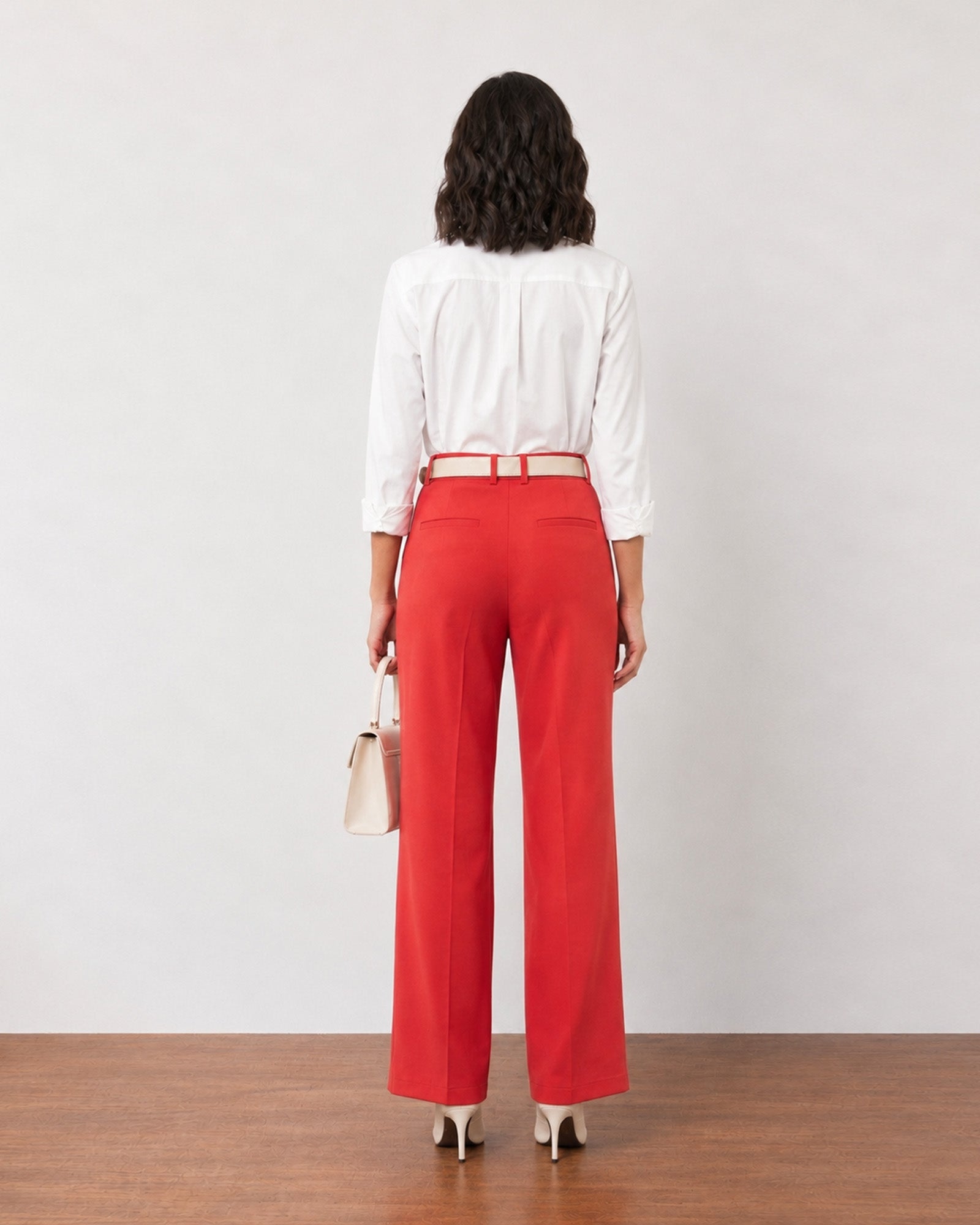 Garnet scarlet red cotton pants, back view with welt pockets