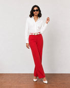 Garnet scarlet red mid-rise cotton pants, walking view