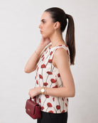 Gaya red and white floral print sleeveless top in breathable 100% cotton, angled side view