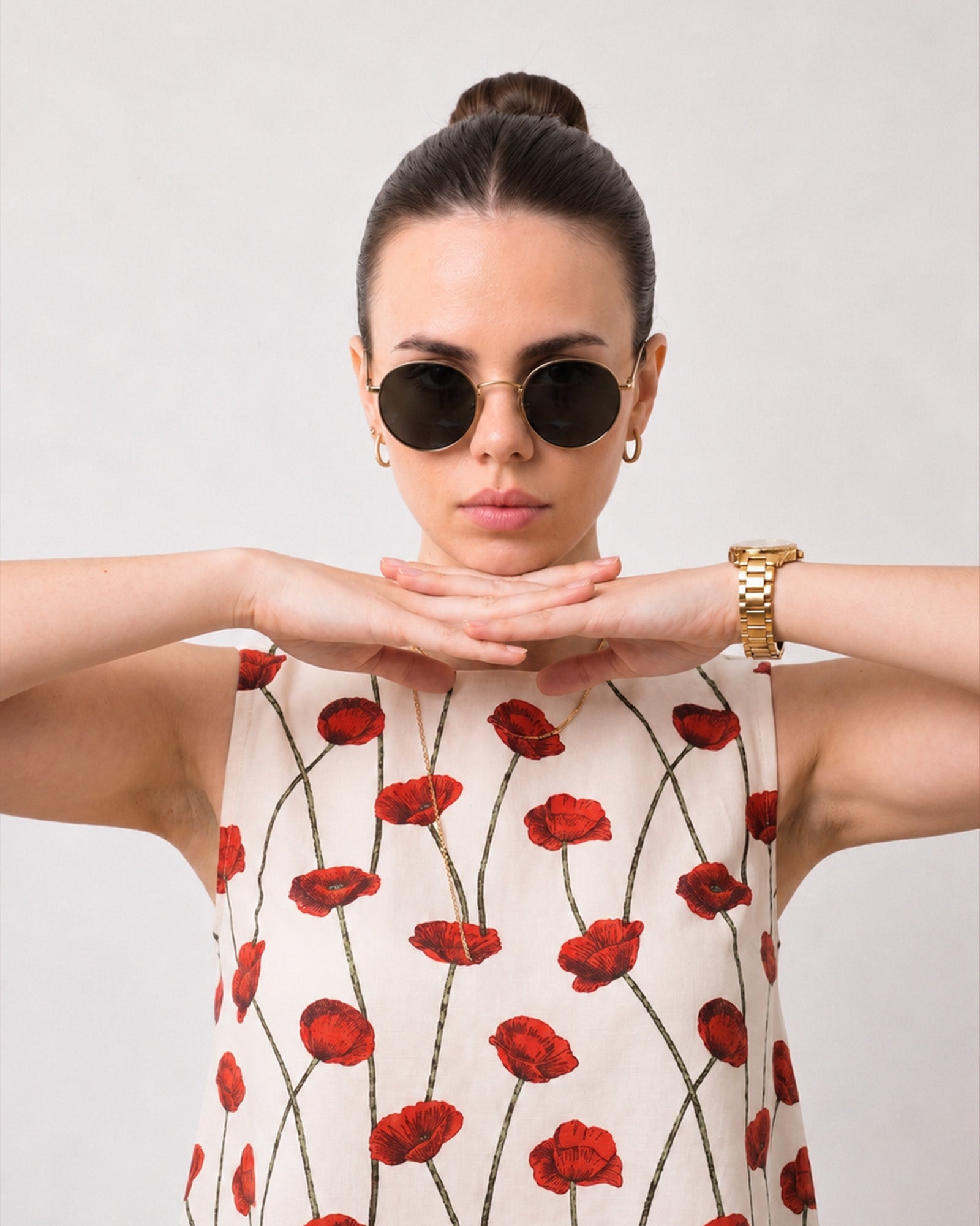 Gaya red and white sleeveless top with a bold poppy digital print motif, front detail