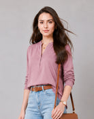Close-up of Gemini rose pink linen tunic split V-neckline, band collar and button placket