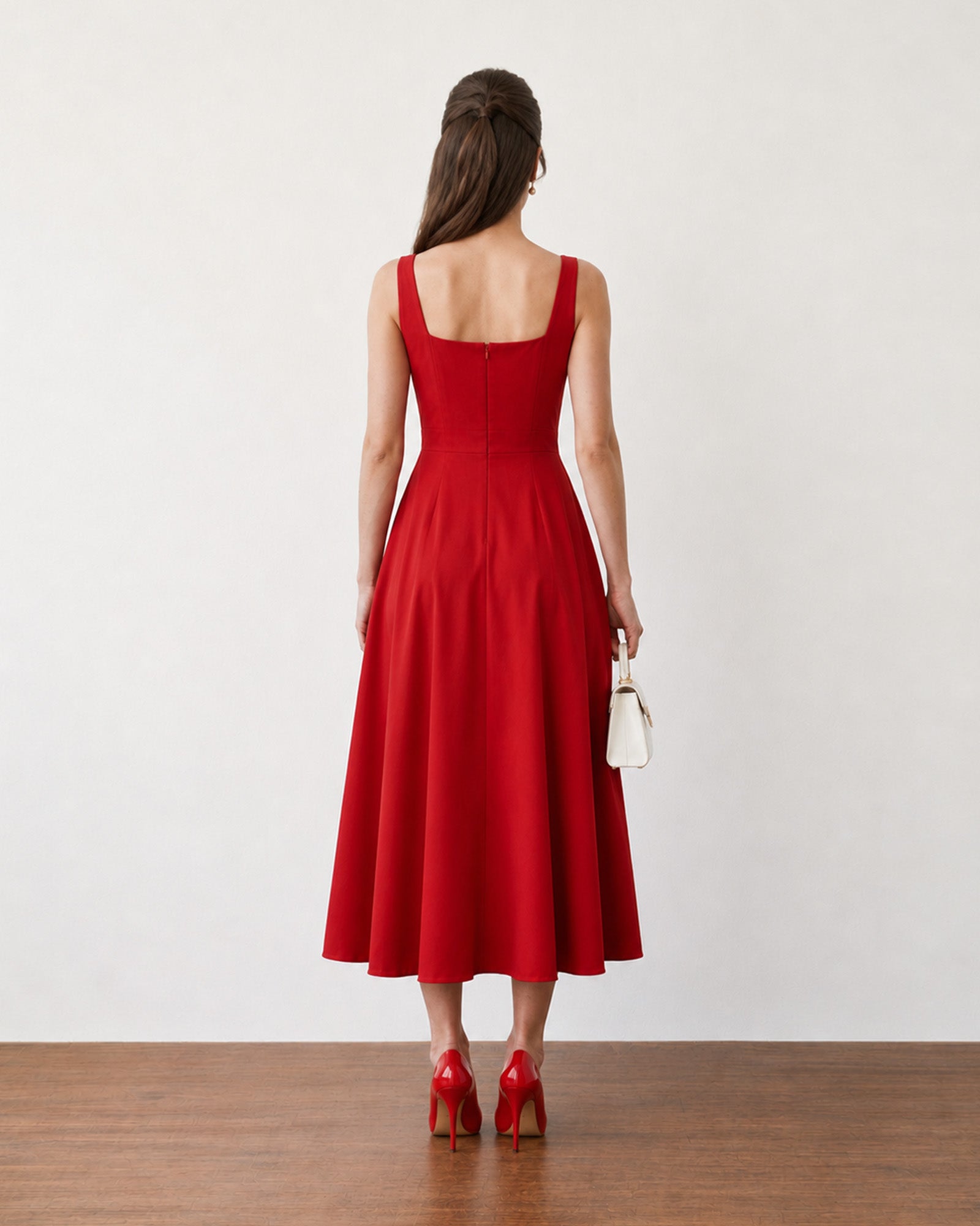 Genesis scarlet red midi dress with cotton voile lining, back view with a concealed zip
