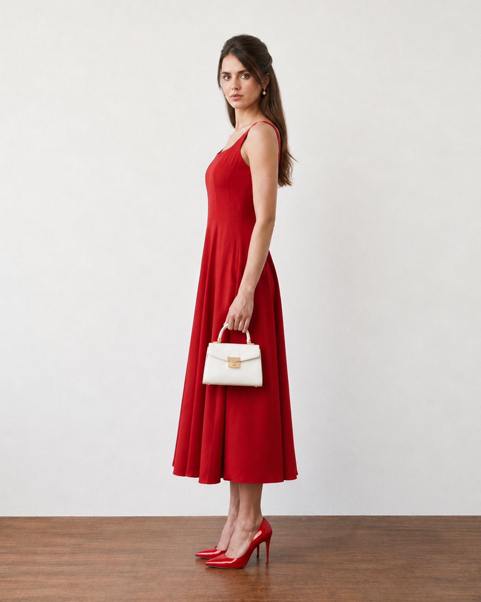 Genesis scarlet red cotton dress with cotton voile lining, side profile showing flared skirt