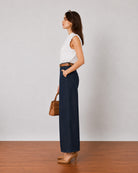 Gigi indigo blue barrel leg denim pants, side profile view