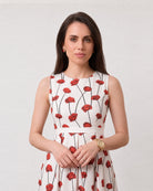 Close-up of Gina red and white dress boat neckline and poppy motif, full cambric lining