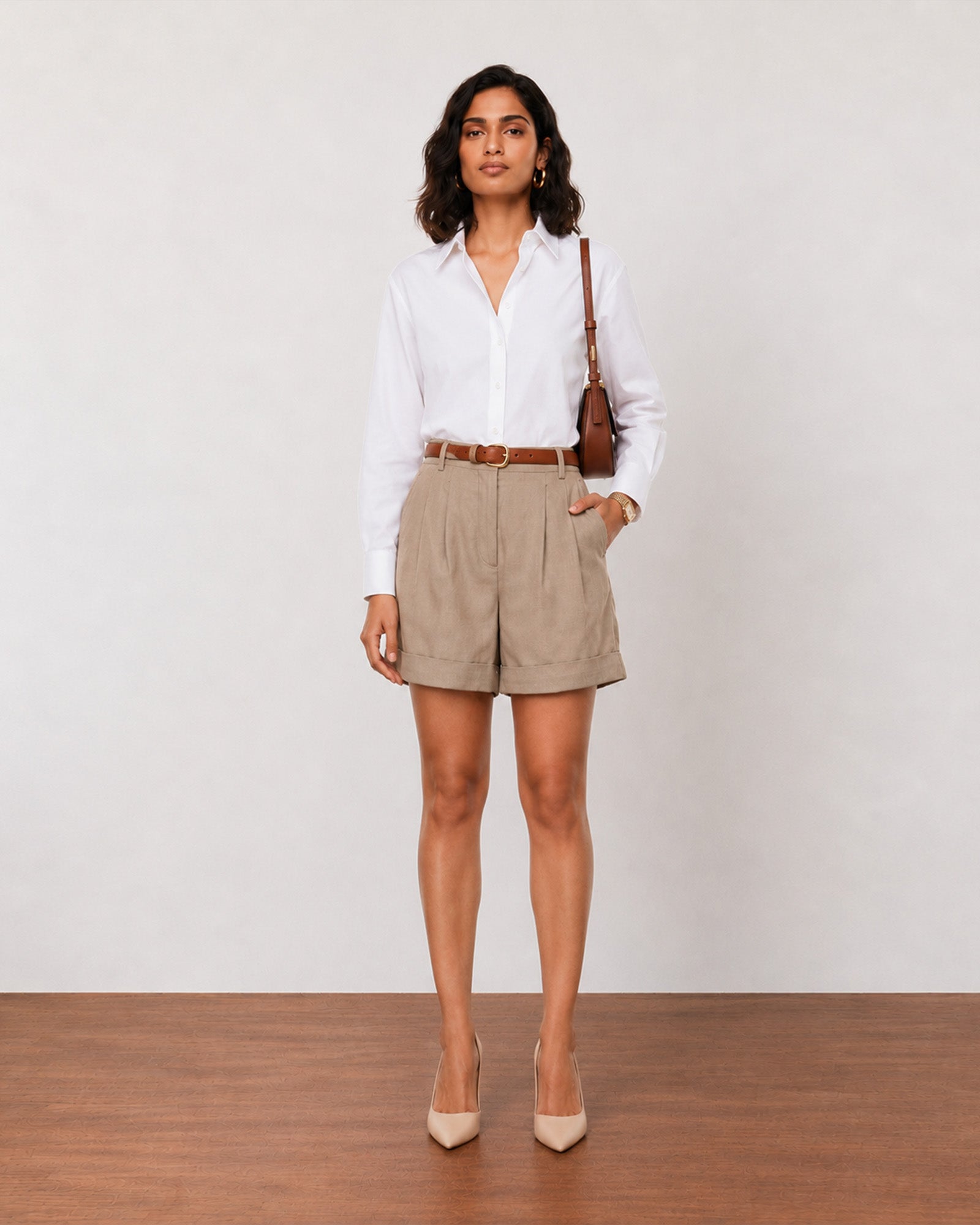 Gazillion Goldy stylish muddy brown high waisted soft linen shorts for women, full-length front view