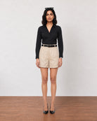 Gazillion Grace elegant beige high waisted pleated soft linen shorts for women, full-length front view