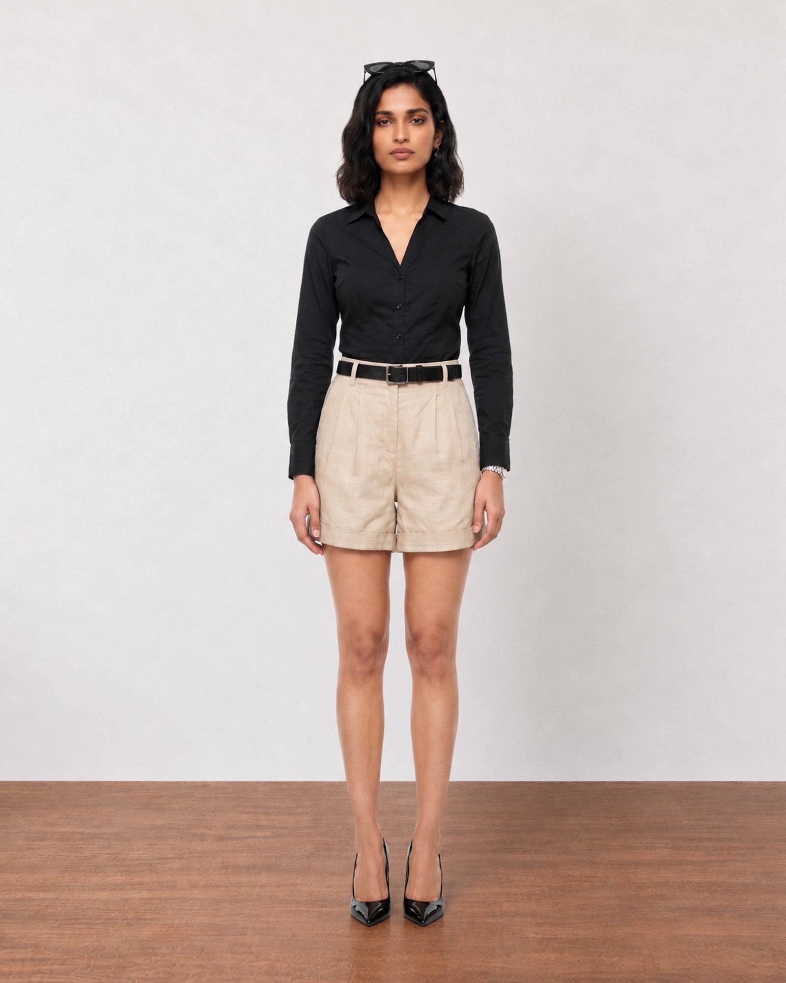 Gazillion Grace elegant beige high waisted pleated soft linen shorts for women, full-length front view