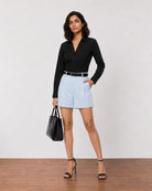 Grace sky blue high waisted pleated linen shorts with deep side pockets, full-length front view