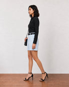 Grace sky blue linen pleated shorts with full cambric lining, side profile view