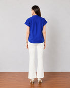 Greta royal blue office top with a smooth cotton satin back, back view
