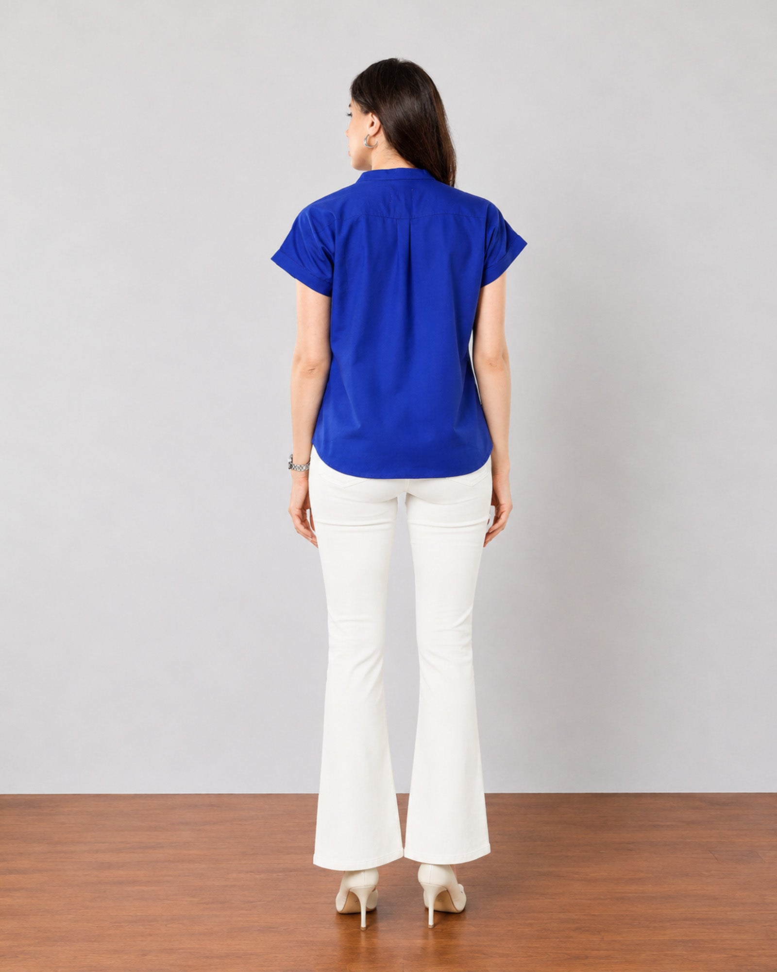 Greta royal blue office top with a smooth cotton satin back, back view