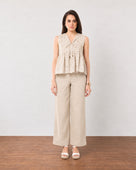 Gazillion Gretchen stylish beige printed peplum top for women, full-length front view