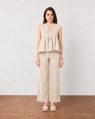 Gazillion Gretchen stylish beige printed peplum top for women, full-length front view
