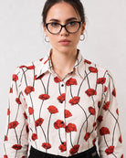 Close-up of Greth shirt red poppy digital print with contrast black buttons and buttoned cuff