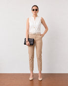Gusta white sleeveless cotton top, angled three-quarter view