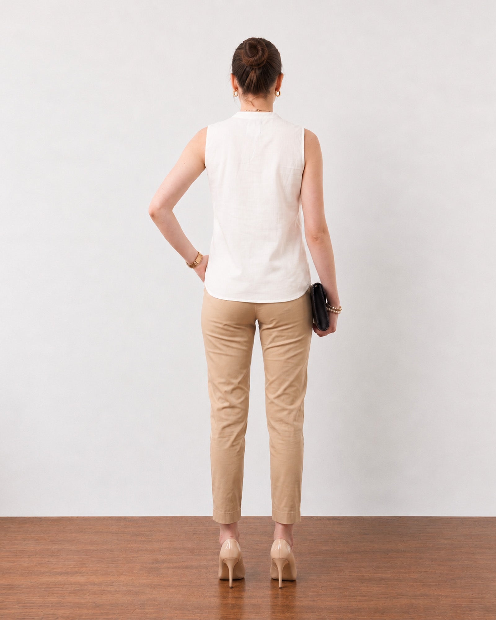 Gusta white sleeveless cotton top with a clean back, back view