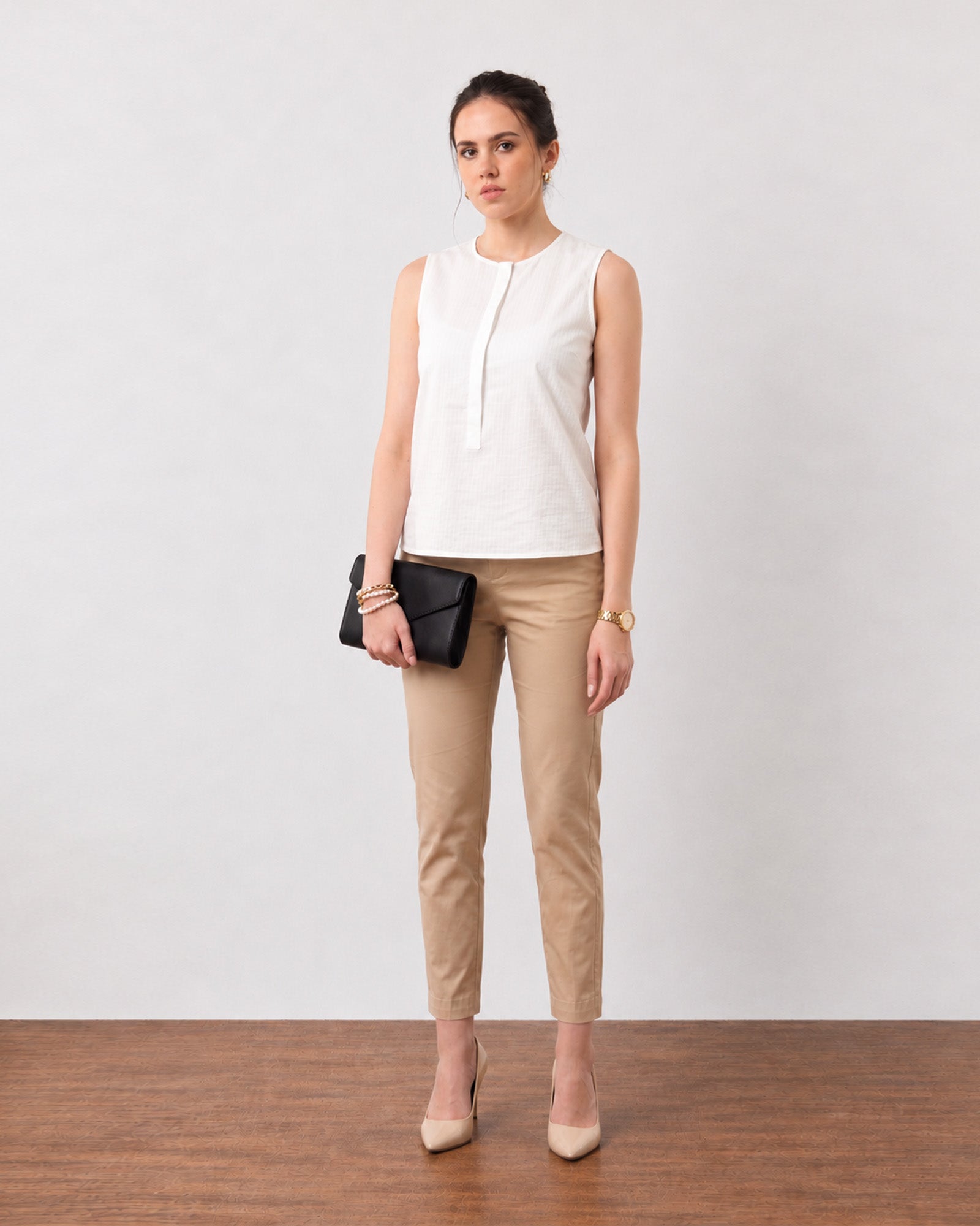 Gazillion Gusta classy white sleeveless pin tucks top for women, full-length front view