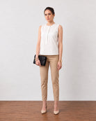 Gazillion Gusta classy white sleeveless pin tucks top for women, full-length front view