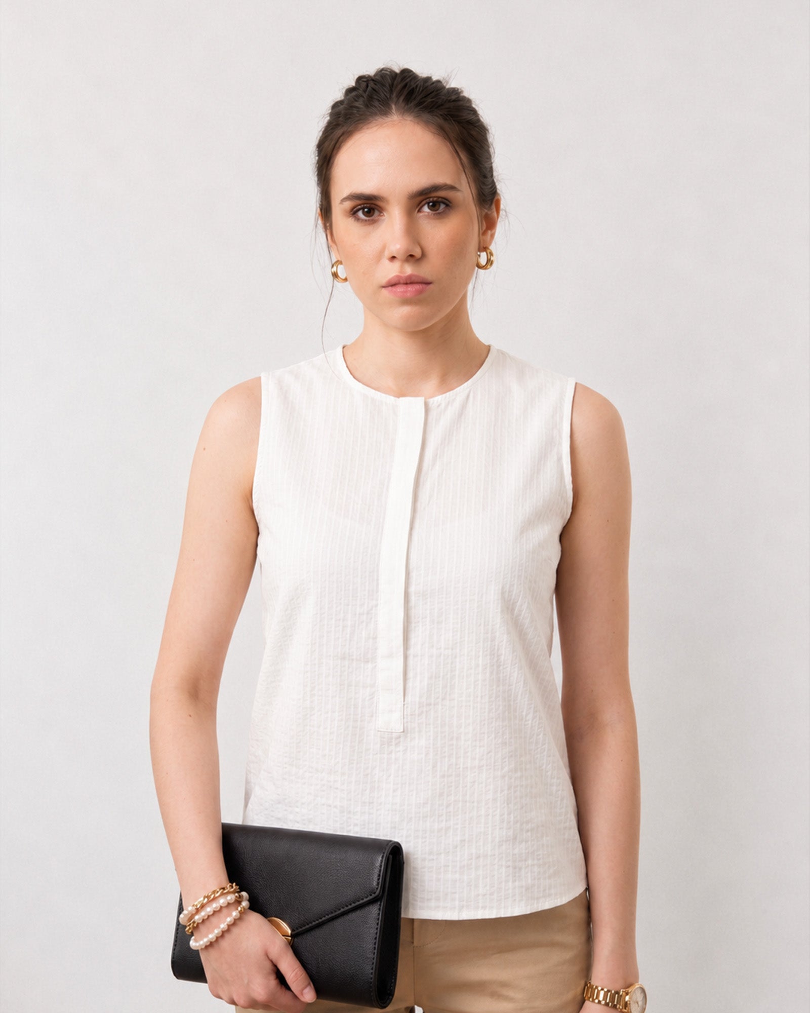Gusta white 100% cotton top with delicate front pin tuck detailing, close-up view