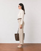 Gwen beige soft linen shirt with a breathable unlined body, side profile view