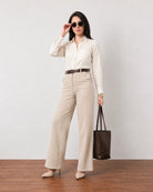 Gwen beige unlined linen shirt with rollable long sleeves, walking view