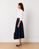 Hansel pleated indigo blue denim midi skirt, side profile view