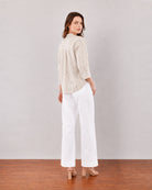 Heaven beige printed shirt, back view showing relaxed shoulder pleats and easy drape