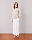Heaven beige printed band collar shirt, front view with hand in pocket