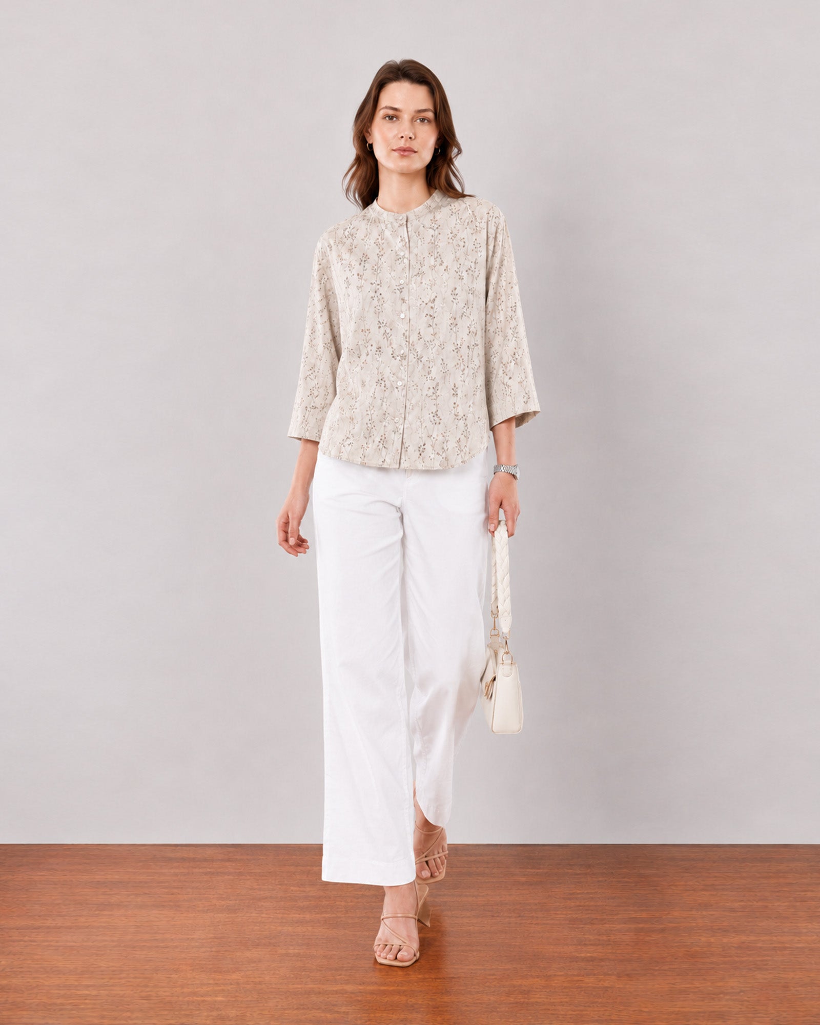 Heaven beige printed shirt styled with white trousers for summer office wear