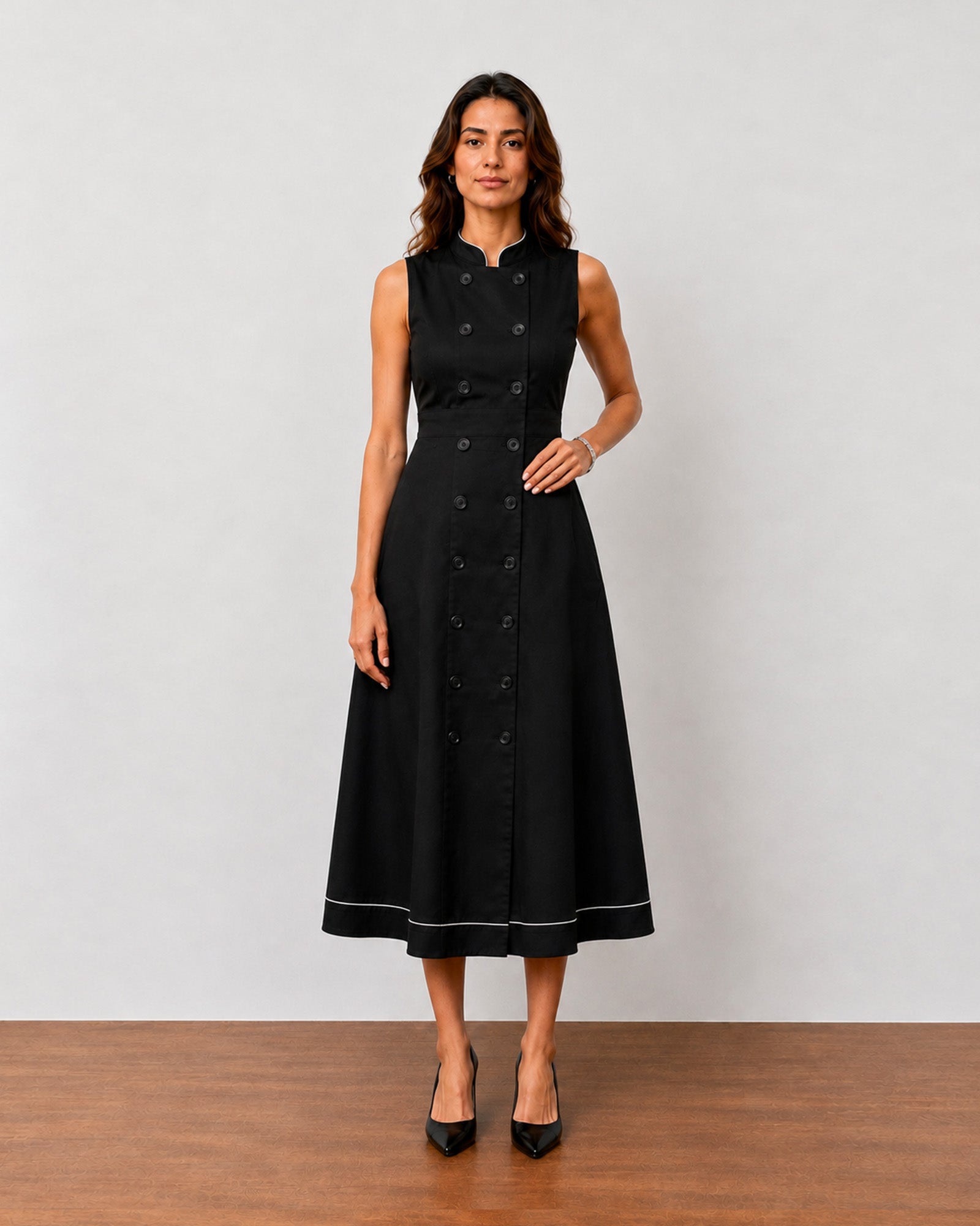 Hectoria black sleeveless cotton midi dress with white contrast piping along the hem