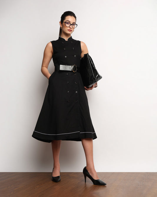 Hectoria black double breasted dress styled with a leather tote, full-length front view