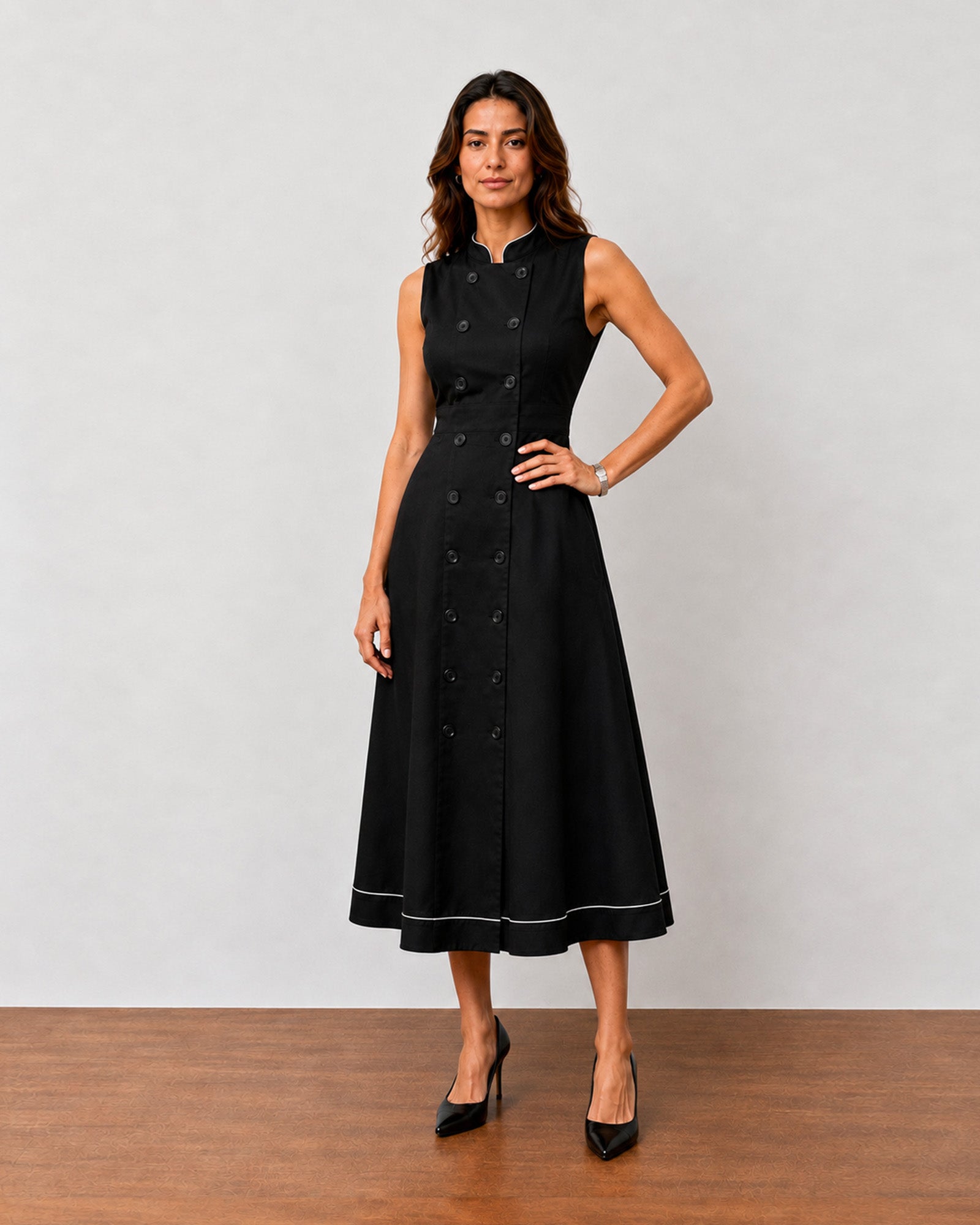 Hectoria black cotton formal dress with full cambric lining and a defined waist seam