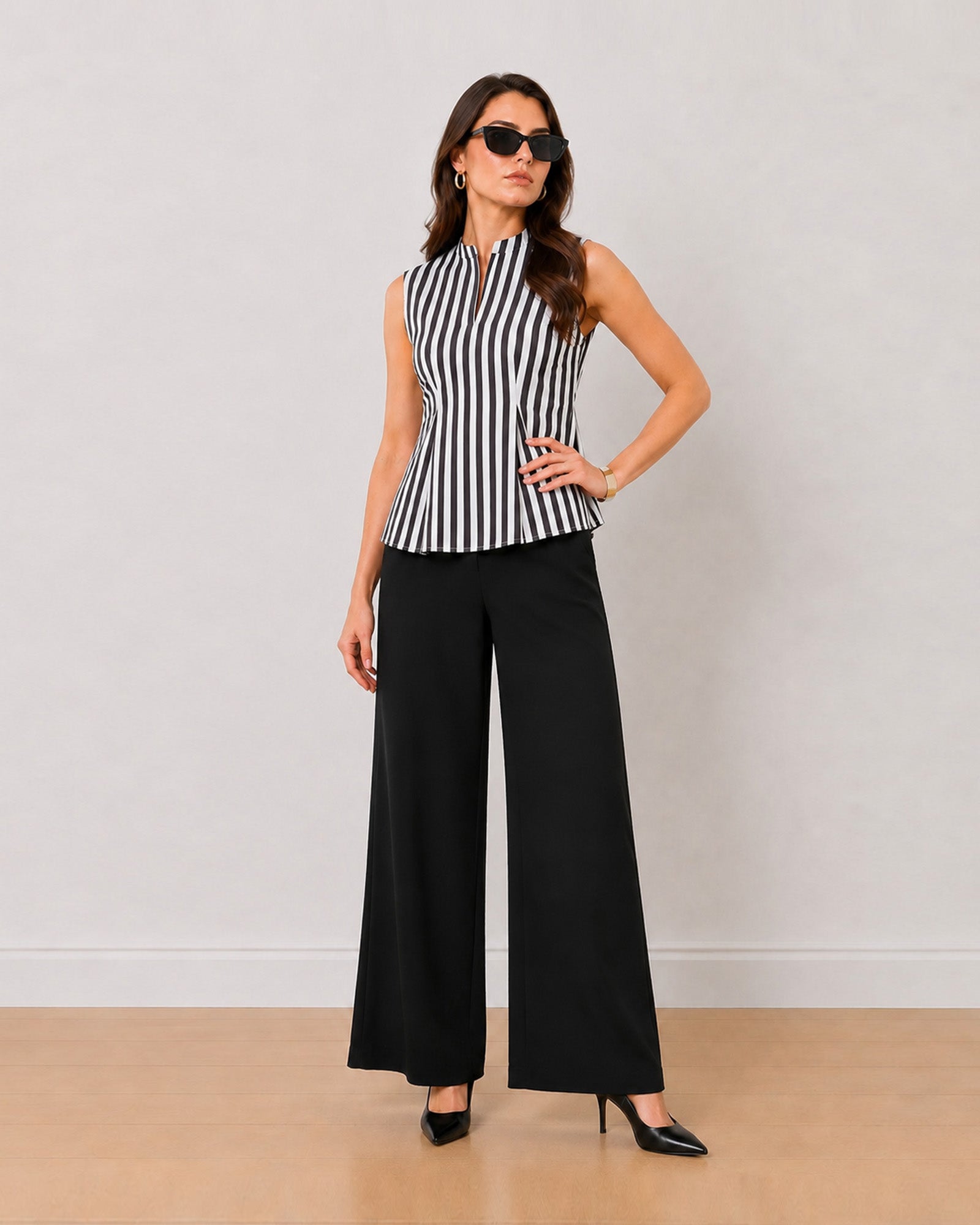 Hellen sleeveless cotton top in black and white stripes with centre seam opening